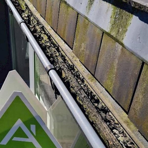 Afwassen dakgoten en rolluiken